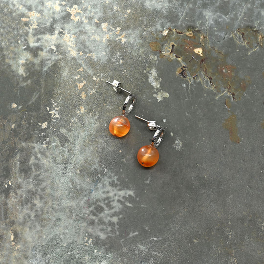 A pair of Egyptian Carnelian Ball Bead earrings, Middle Kingdom, ca.  2141 - 2122 BCE