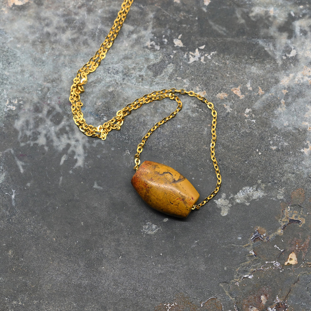 A rare Egyptian Yellow Jasper Bead Pendant, New Kingdom, 18th Dynasty, ca. 1550-1295 BCE