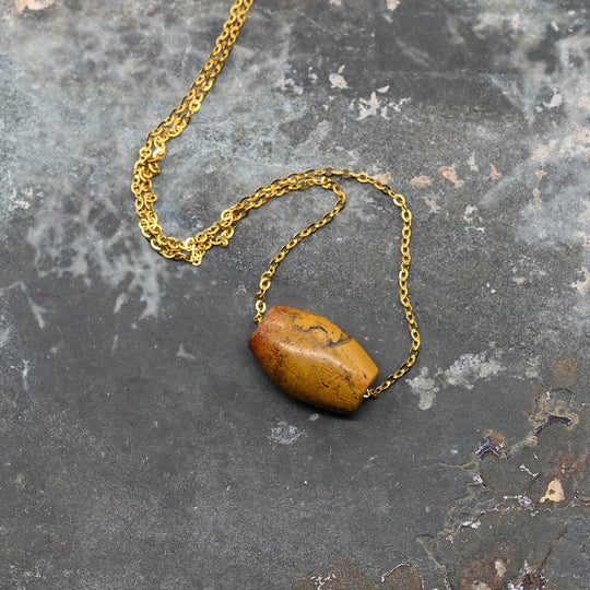 A rare Egyptian Yellow Jasper Bead Pendant, New Kingdom, 18th Dynasty, ca. 1550-1295 BCE