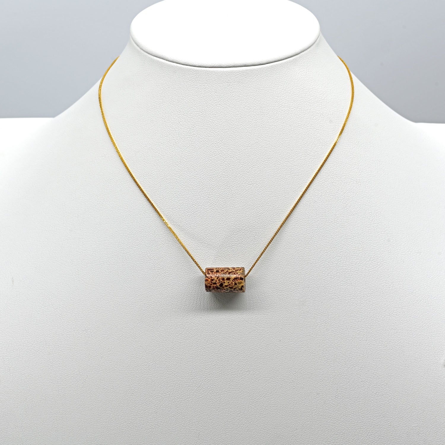 A Neo-Assyrian Brecciated Jasper Bead Pendant, 1st millennium BCE