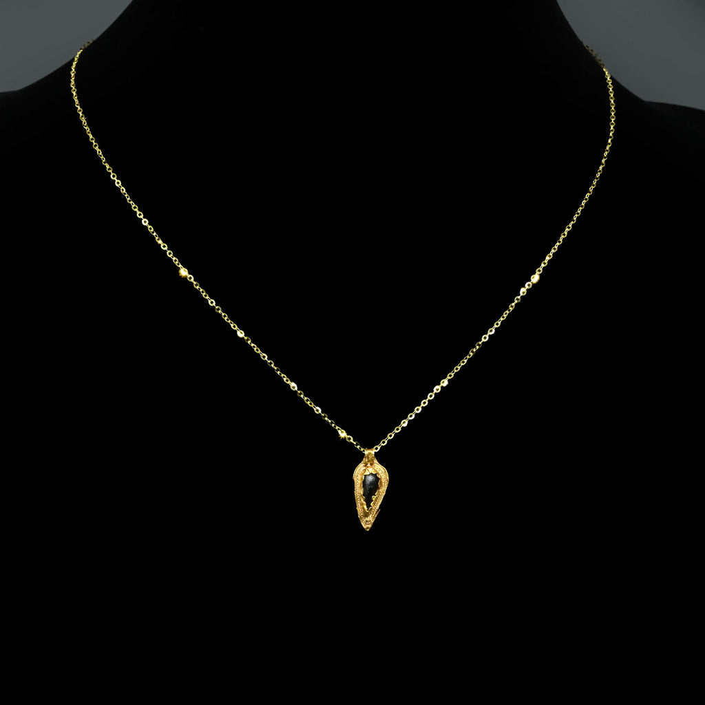 A Hellenistic Gold and Garnet Pendant, Hellenistic Period, ca. 3rd - 1st century BCE