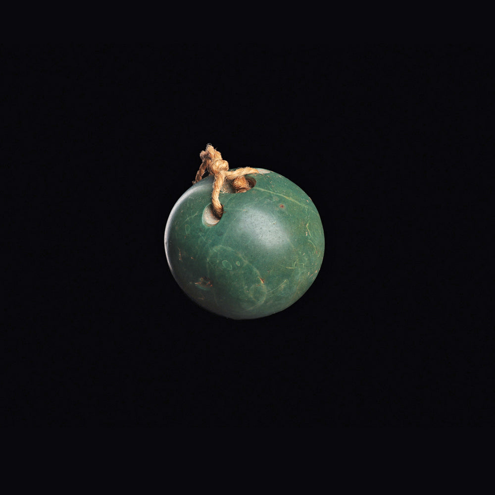 A Costa Rican Green Serpentine Bola Ball, ca. 500 - 1000 CE