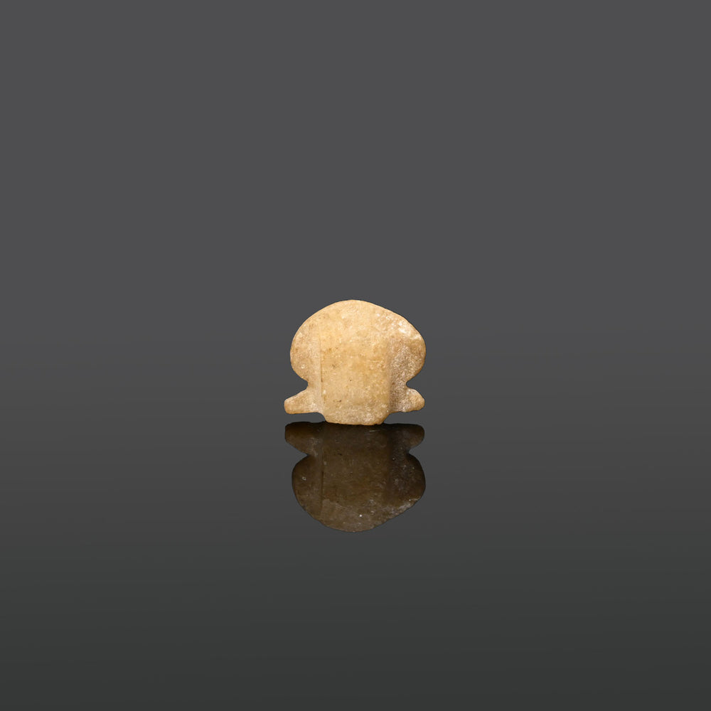 An Egyptian Alabaster Sun Disc Amulet, Late Period, ca. 664 - 332 BCE