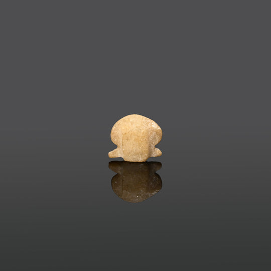 An Egyptian Alabaster Sun Disc Amulet, Late Period, ca. 664 - 332 BCE