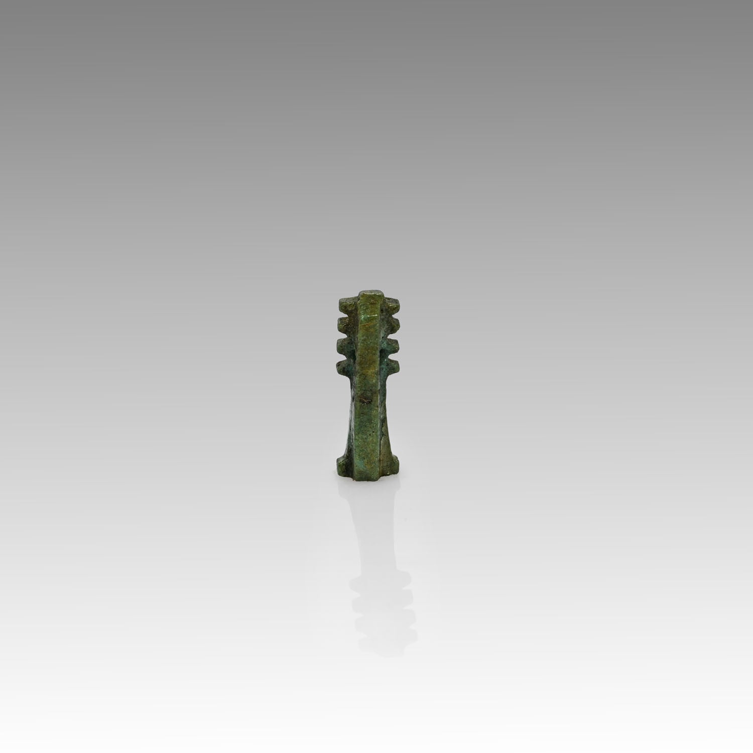 An Egyptian Green Faience Djed Pillar Amulet, Late Period, ca. 664 - 332 BCE