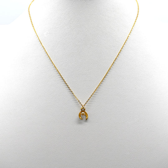 A tiny Roman Gold and Pearl Luna Pendant, Roman Imperial Period, ca. 1st - 2nd century CE