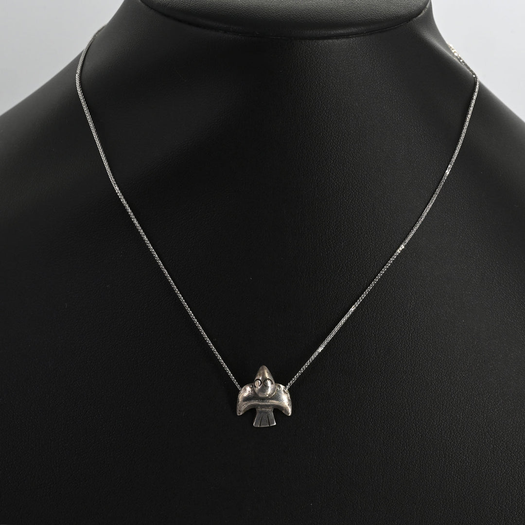 A superb Moche Silver Sea Bird Pendant, ca. 100 BCE - 300 CE
