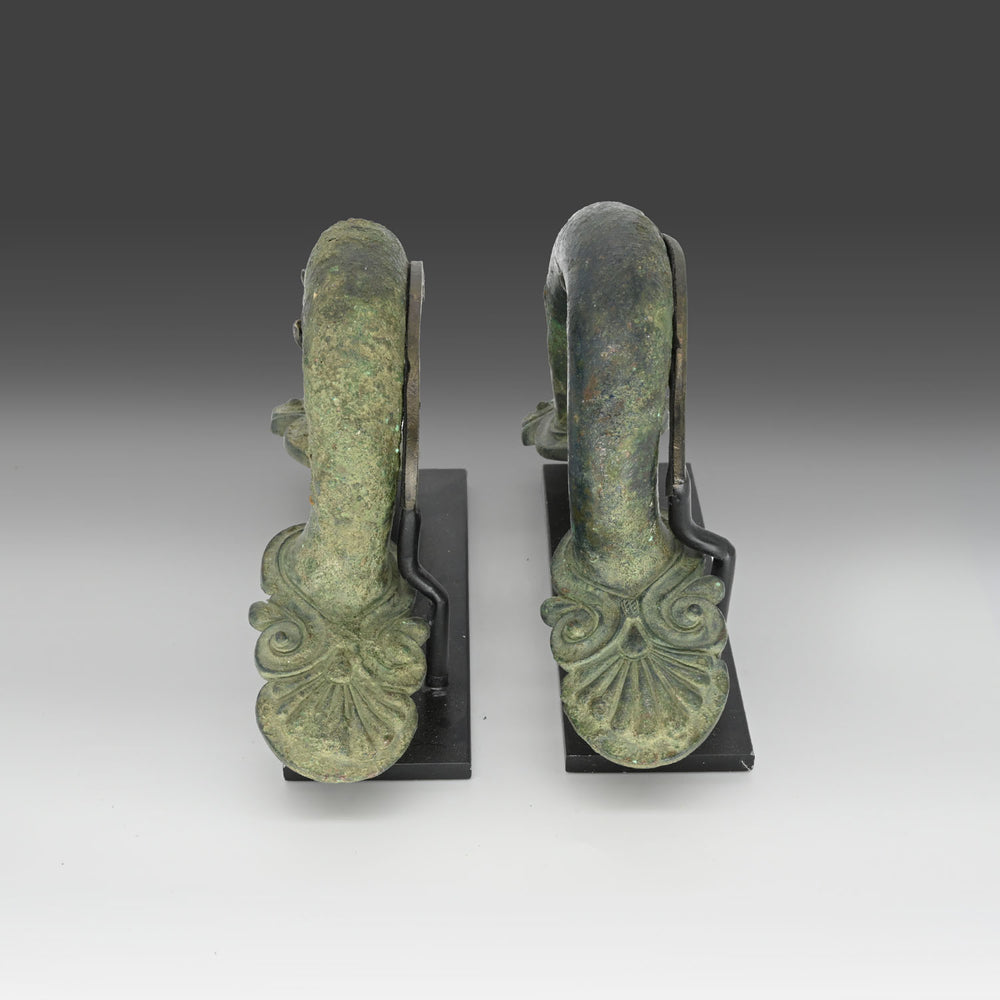 A pair of Greek bronze Hydria Handles, Classical period, ca. 5th century BCE