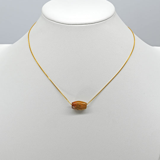 A rare Egyptian Yellow Jasper Bead Pendant, New Kingdom, 18th Dynasty, ca. 1550-1295 BCE