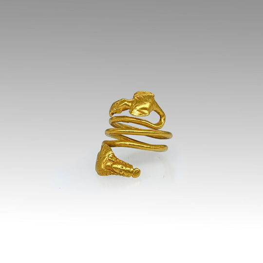 A Published Egypto-Roman Gold Spiral Snake Ring with Isis and Ptah Terminals, Roman Imperial Period, ca. 1st century CE