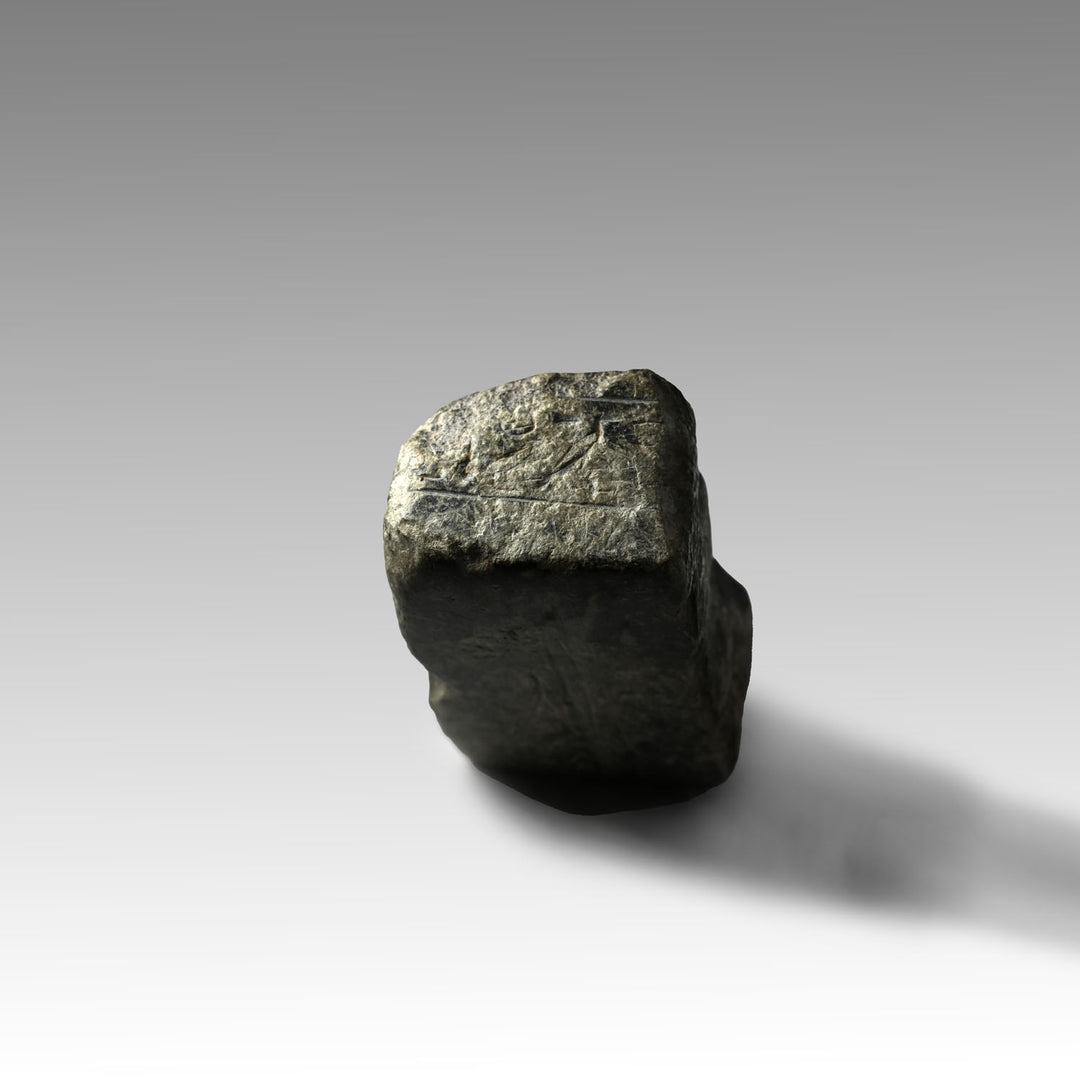 An Egyptian Granite Fragmentary Base with Inscription, Late Period, 29th-30th Dynasty, ca. 380 - 332 BCE