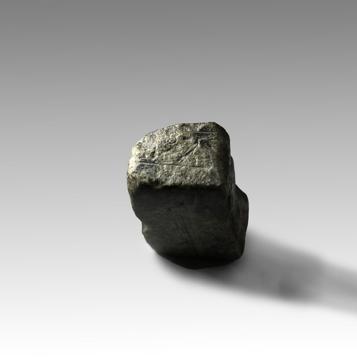 An Egyptian Granite Fragmentary Base with Inscription, Late Period, 29th-30th Dynasty, ca. 380 - 332 BCE