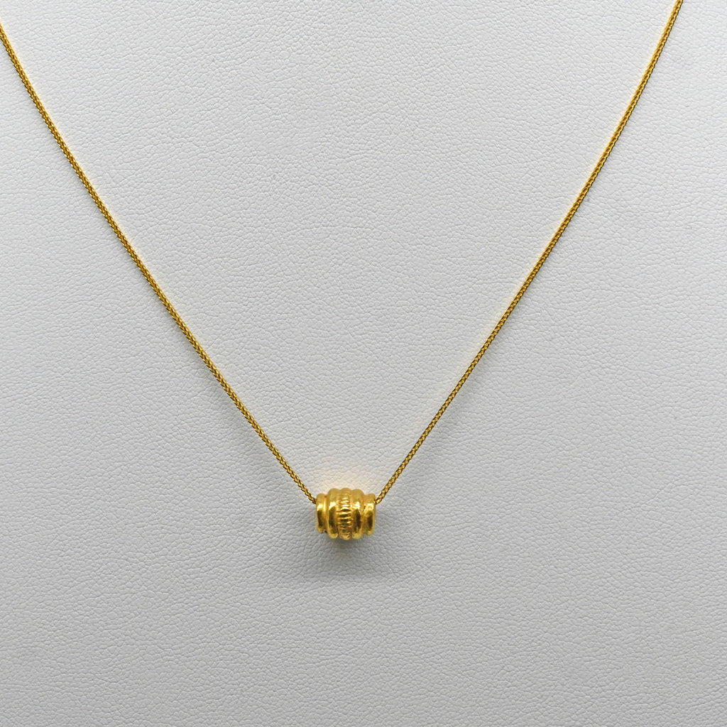 A Persian Gold Bead Pendant, Achaemenid Period, ca. 550 - 330 BCE