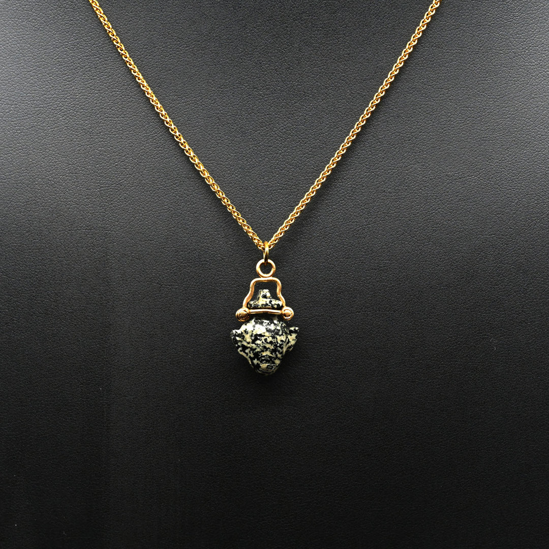 An Egyptian Diorite Heart Amulet pendant, Late Period, ca.  664 - 332 BCE