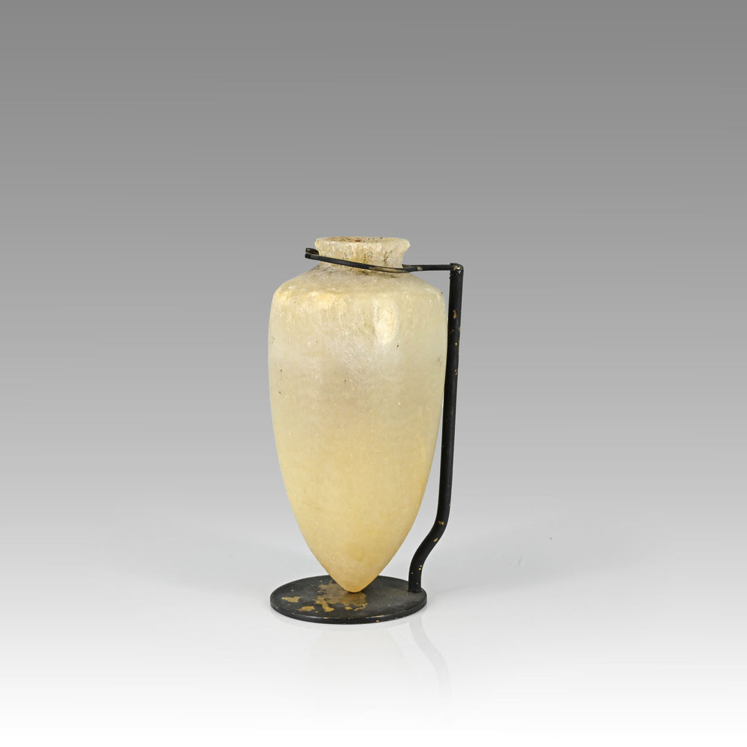 An Egyptian pointed-base alabastron, New Kingdom, ca. 1570 - 1070