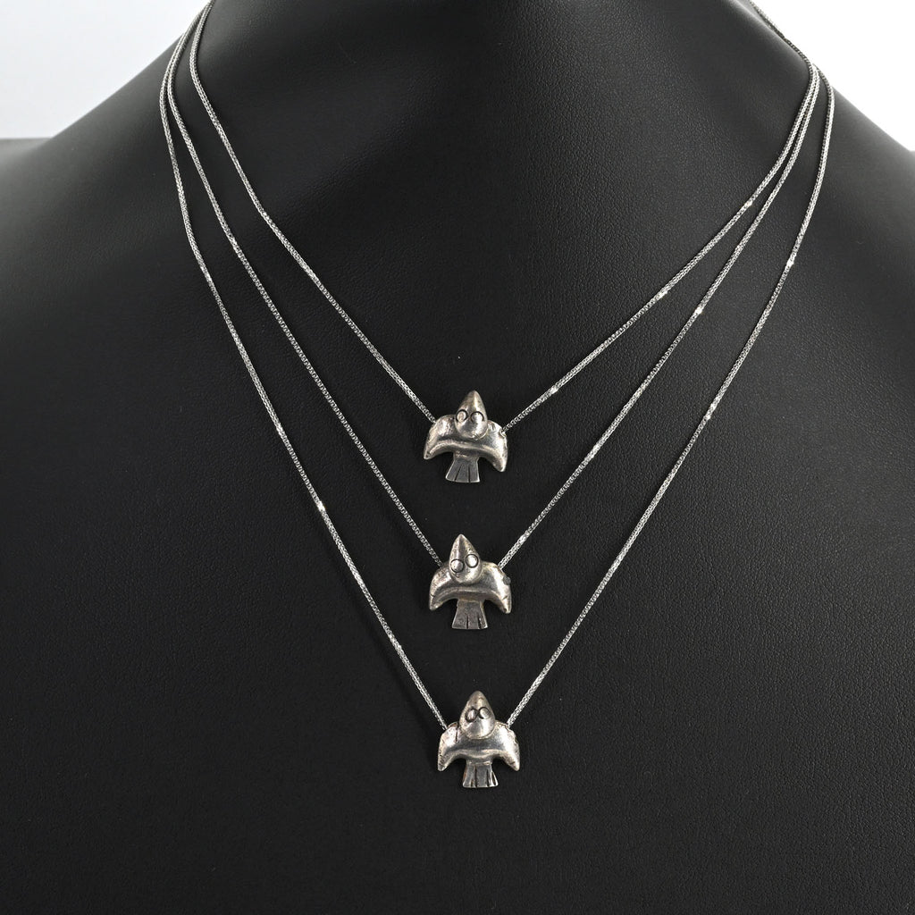 A superb Moche Silver Sea Bird Pendant, ca. 100 BCE - 300 CE