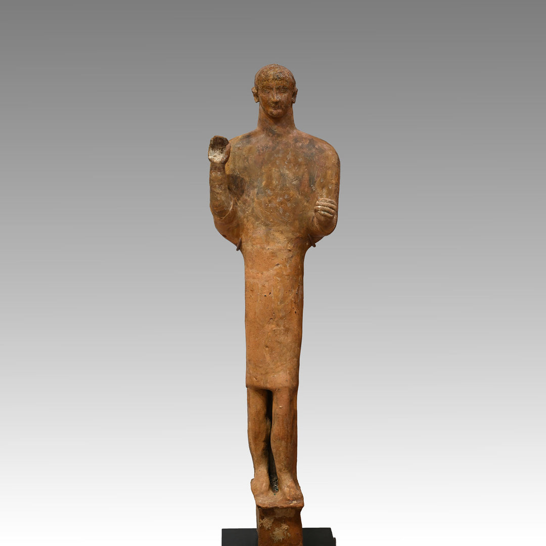 A large Phoenician terracotta standing youth, Neo Assyrian Period, ca. 6th century BCE