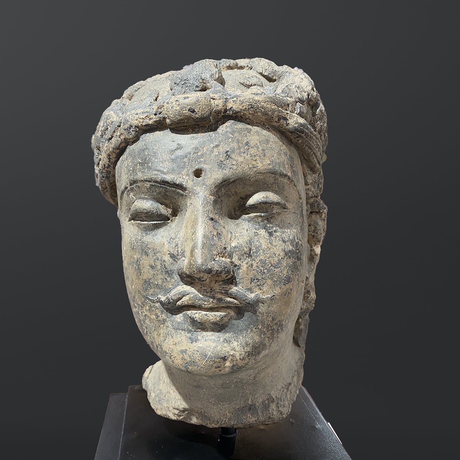 A fine Gandhara Grey Schist Head of a Bodhisattva, ca. 2nd - 3rd century CE