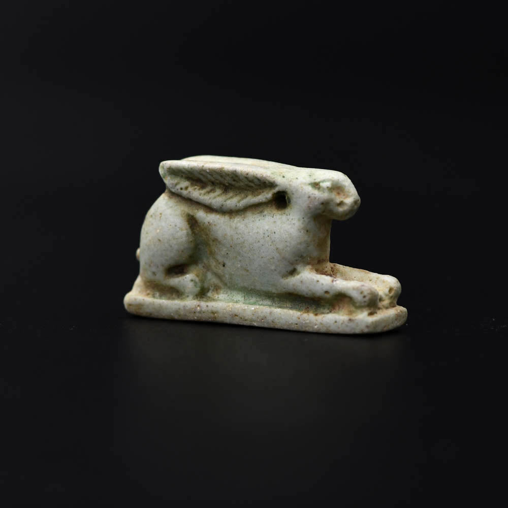 An Egyptian Faience Amulet of a Hare, Late Period, Dynasty 26, ca. 664 - 525 BCE