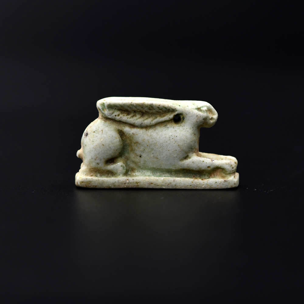 An Egyptian Faience Amulet of a Hare, Late Period, Dynasty 26, ca. 664 - 525 BCE