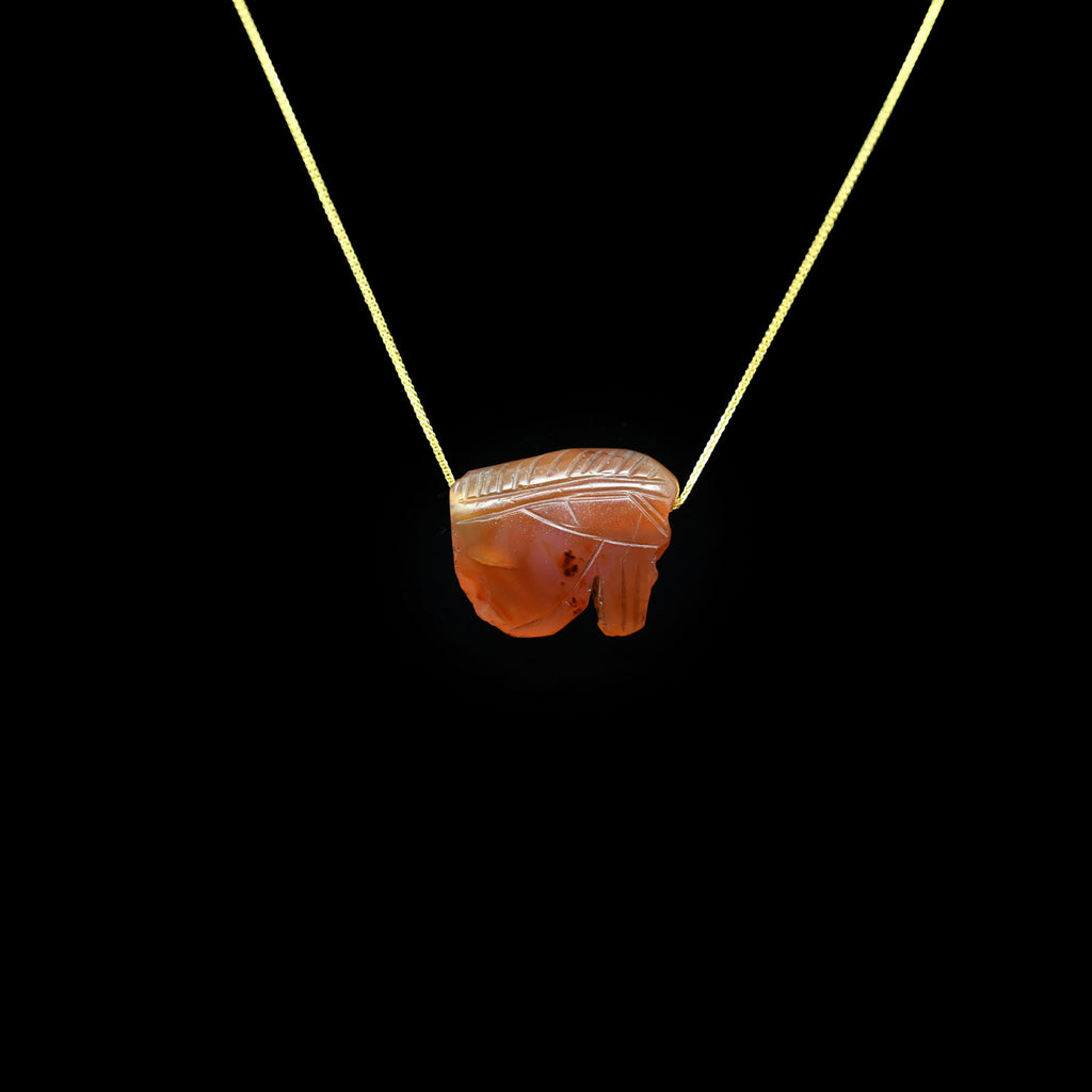 A large Carnelian Wedjat Eye pendant, Late Period, ca. 664 - 332 BCE