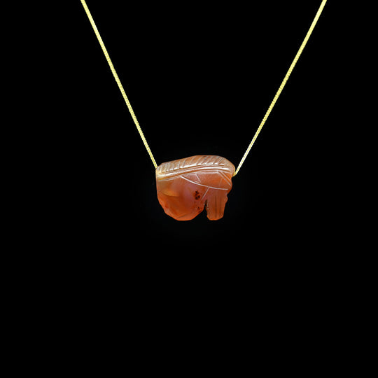 A large Carnelian Wedjat Eye pendant, Late Period, ca. 664 - 332 BCE