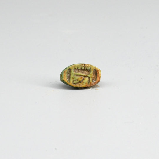 A Egyptian Green Glazed Faience Scaraboid, New Kingdom, ca. 1550 - 1069 BCE