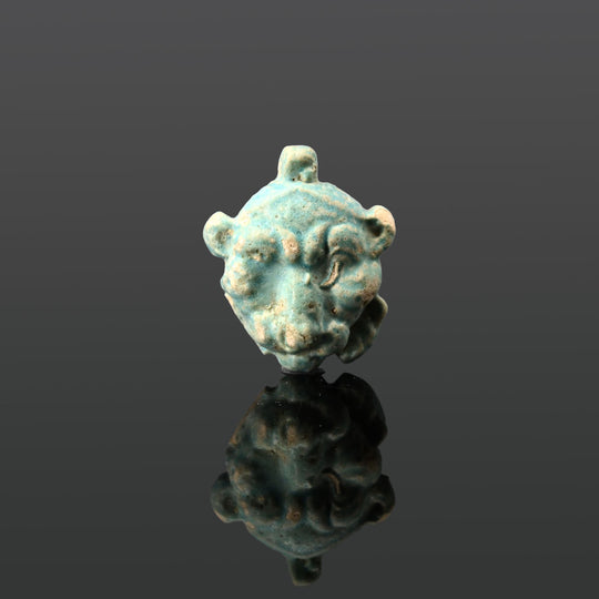 An Egyptian Faience Lion Head Amulet, Late Period, ca. 664 - 332 BCE
