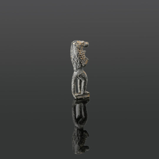 An Egyptian Black Steatite Monkey Amulet, New Kingdom, ca.  1550 - 1069 BCE