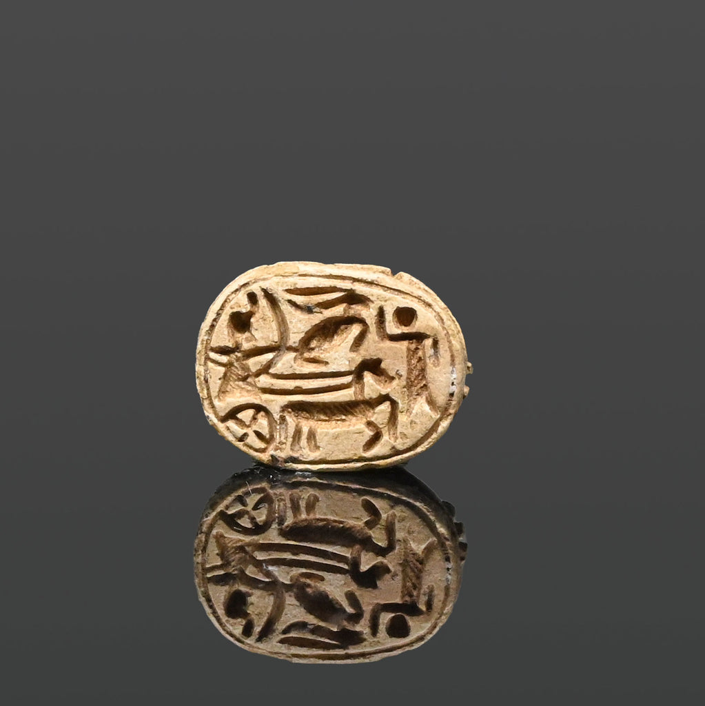 An Egyptian Steatite Scarab of a Royal hunting scene, New Kingdom, 18th Dynasty, ca.  1550 - 1295 BCE