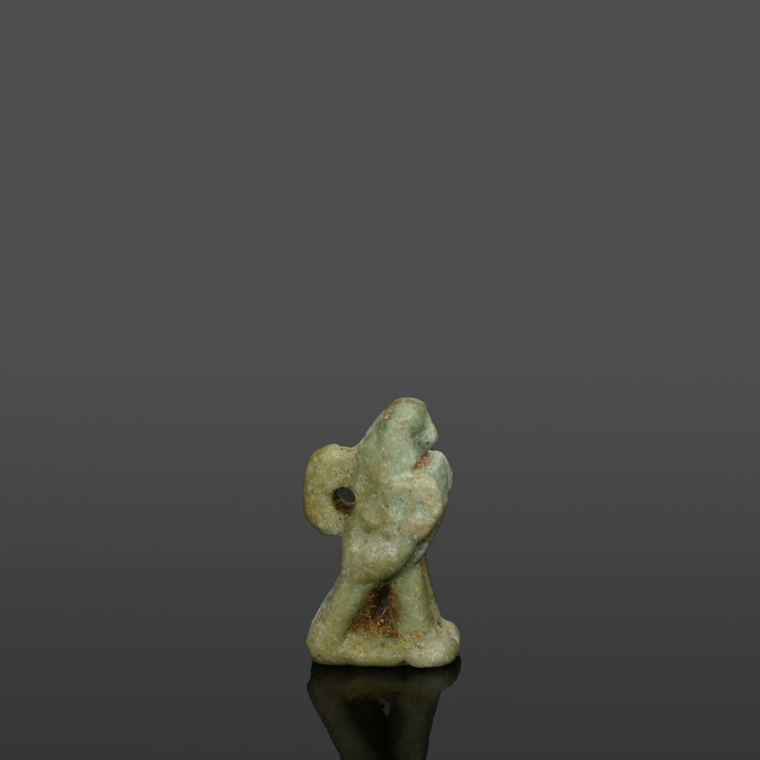 An Egyptian Green Faience Falcon Amulet, Late Period, ca. 664 - 332 BCE