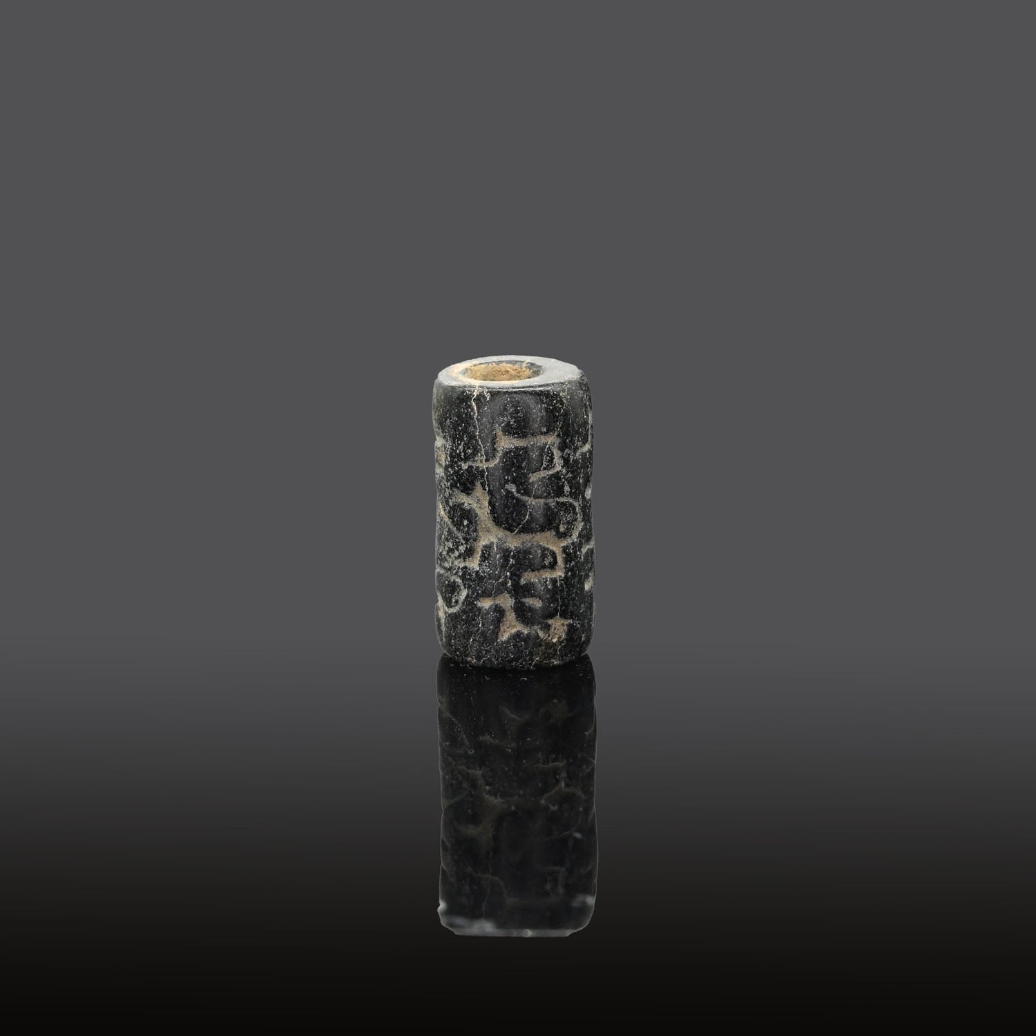 A rare Egyptian Steatite Cylinder Seal with Anubis, Early Dynastic Period - Old Kingdom, ca.  3000 - 2750 BCE