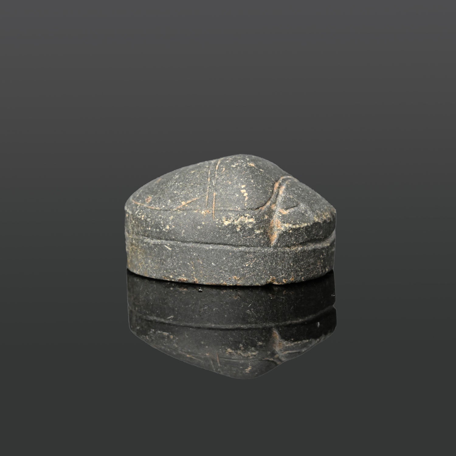 A large Egyptian Greenstone Heart Scarab, Late Period, ca. 664 - 332 BCE