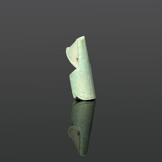 An Egyptian Faience Red Crown Amulet, Late Period, ca. 664 - 332 BCE