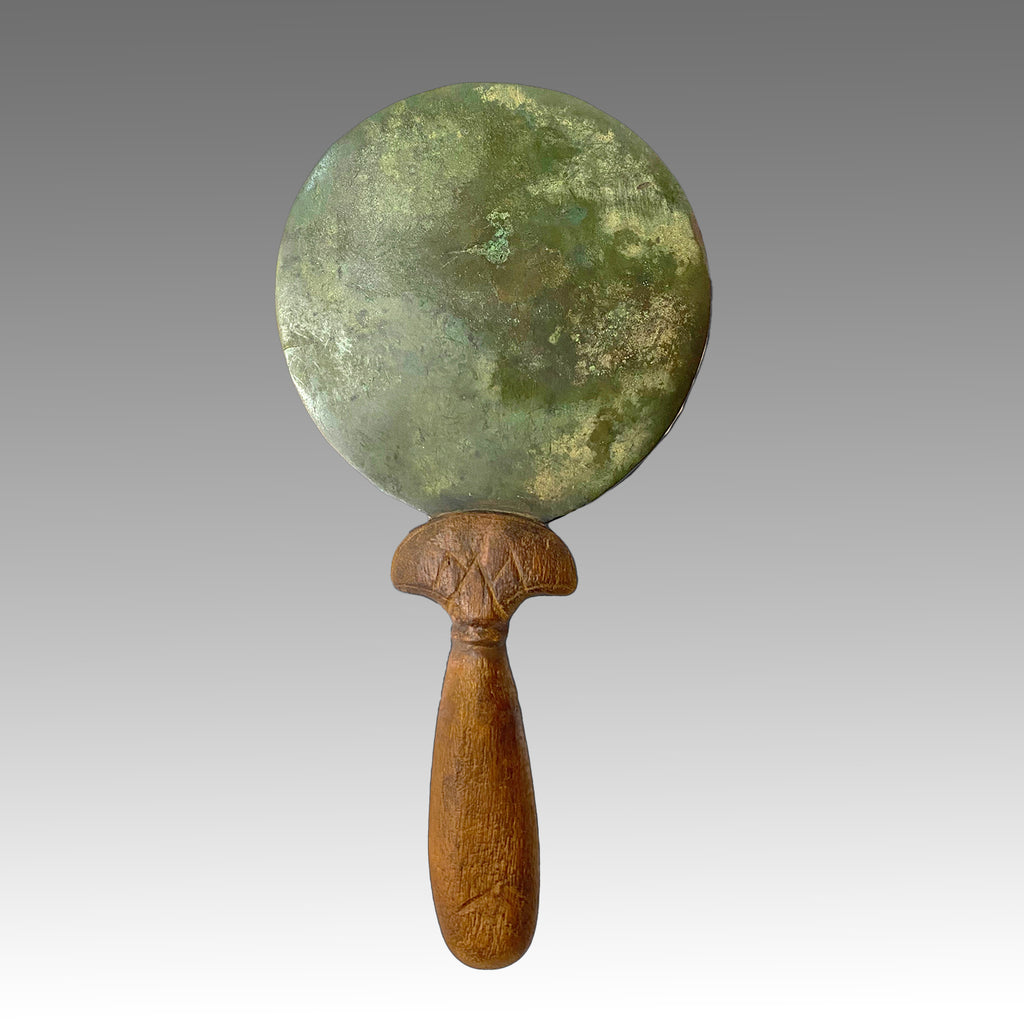 A fine Egyptian Bronze Toilet Mirror, Middle Kingdom, ca. 1938 - 1758 BCE