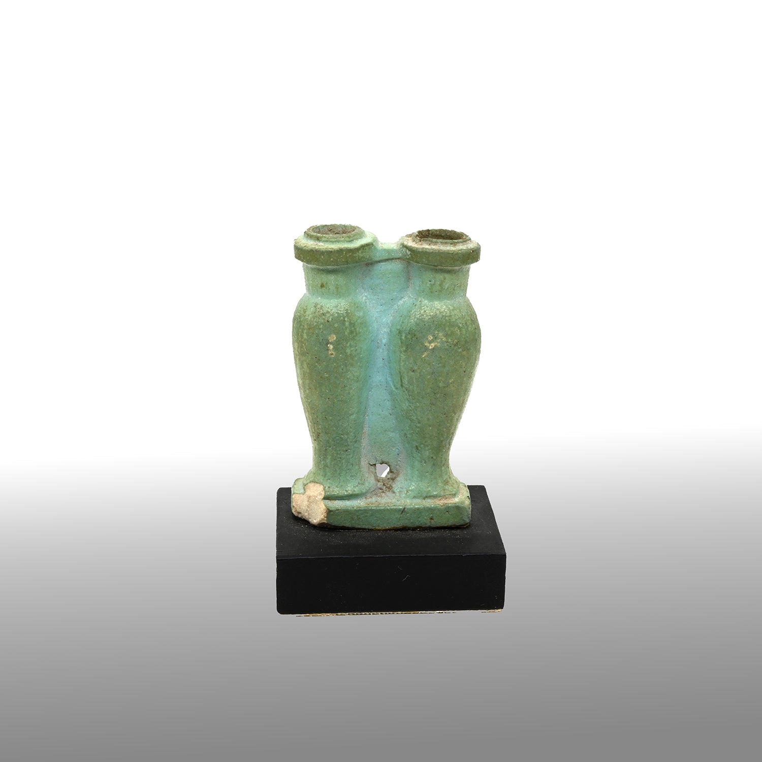 A Published Egyptian Faience Double Kohl Jar, Late Period, ca. 664 - 332 BCE