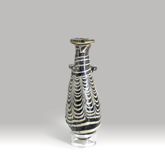 An Egyptian Core-Formed Glass Alabastron, Ptolemaic  Period, ca. 3rd - 2nd century BCE