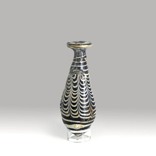 An Egyptian Core-Formed Glass Alabastron, Ptolemaic  Period, ca. 3rd - 2nd century BCE