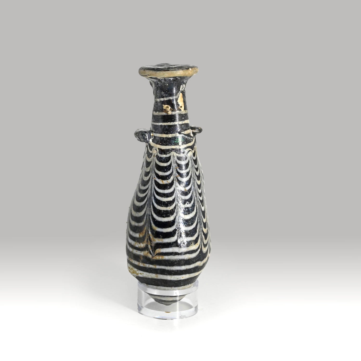 An Egyptian Core-Formed Glass Alabastron, Ptolemaic  Period, ca. 3rd - 2nd century BCE