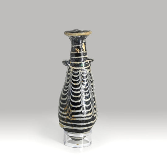 An Egyptian Core-Formed Glass Alabastron, Ptolemaic  Period, ca. 3rd - 2nd century BCE