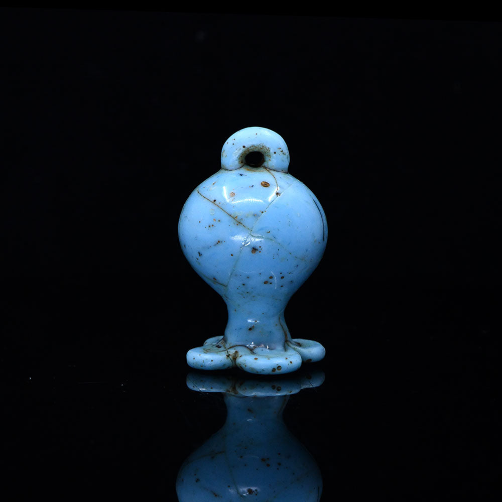 A rare Egyptian Glass Pomegranate Pendant, New Kingdom, Amarna Period , ca. 1353 - 1336 BCE