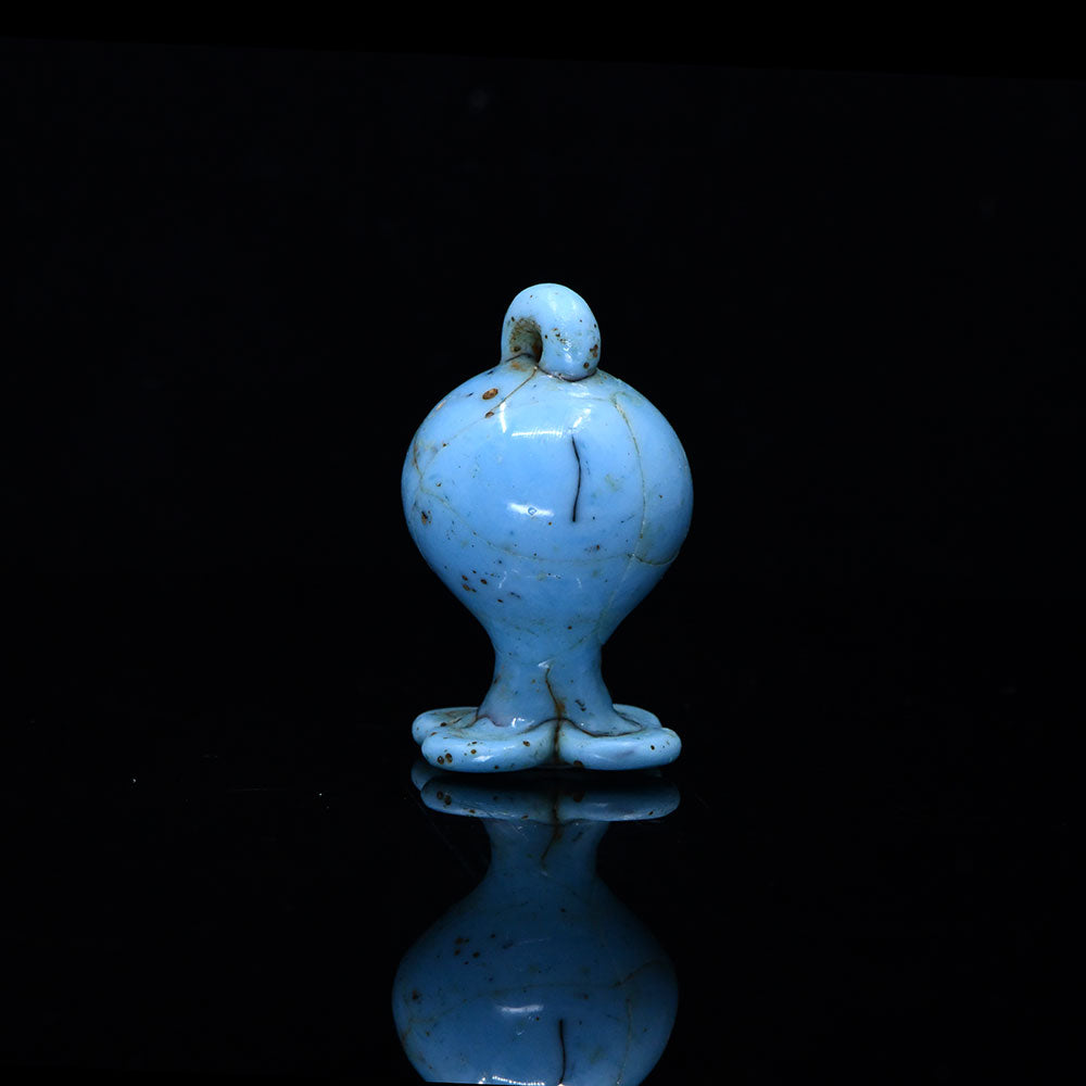 A rare Egyptian Glass Pomegranate Pendant, New Kingdom, Amarna Period , ca. 1353 - 1336 BCE