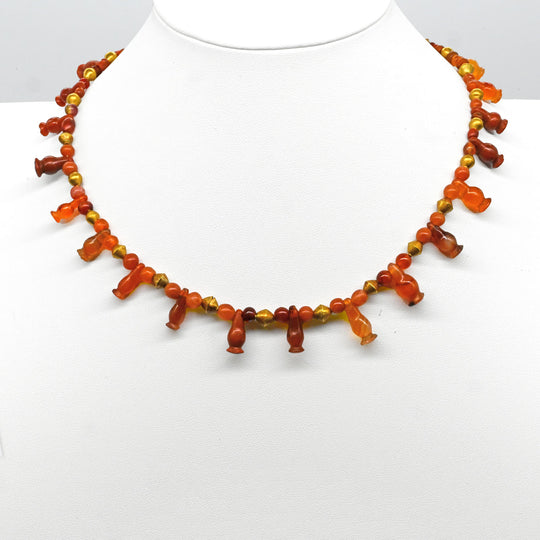 An Egyptian Carnelian, Red Jasper and Gold Bead Necklace, late 18th Dynasty, ca. 1350 - 1295 BCE