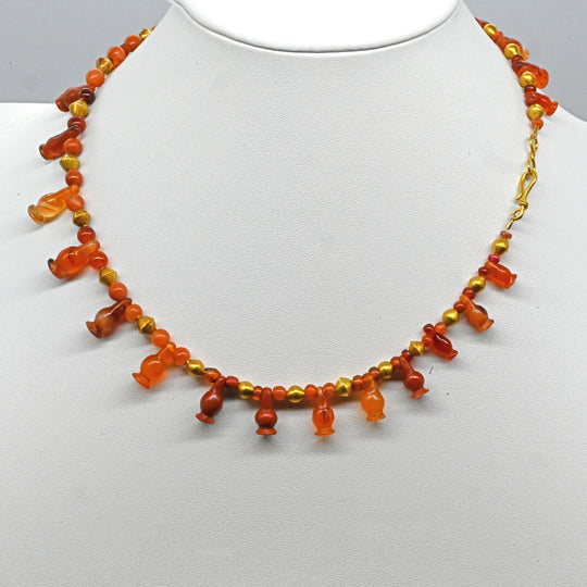 An Egyptian Carnelian, Red Jasper and Gold Bead Necklace, late 18th Dynasty, ca. 1350 - 1295 BCE