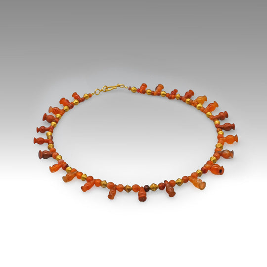 An Egyptian Carnelian, Red Jasper and Gold Bead Necklace, late 18th Dynasty, ca. 1350 - 1295 BCE