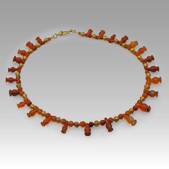 An Egyptian Carnelian, Red Jasper and Gold Bead Necklace, late 18th Dynasty, ca. 1350 - 1295 BCE