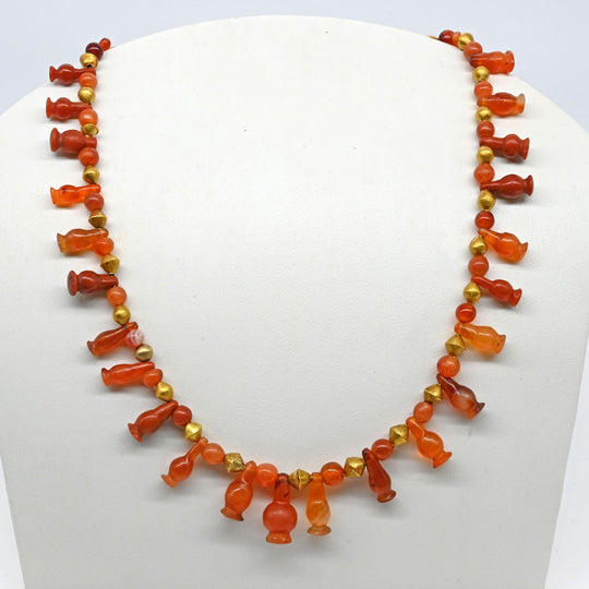 An Egyptian Carnelian and Gold Bead Necklace, late 18th Dynasty, ca. 1350 - 1295 BCE