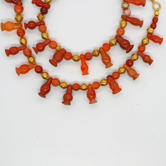 An Egyptian Carnelian and Gold Bead Necklace, late 18th Dynasty, ca. 1350 - 1295 BCE