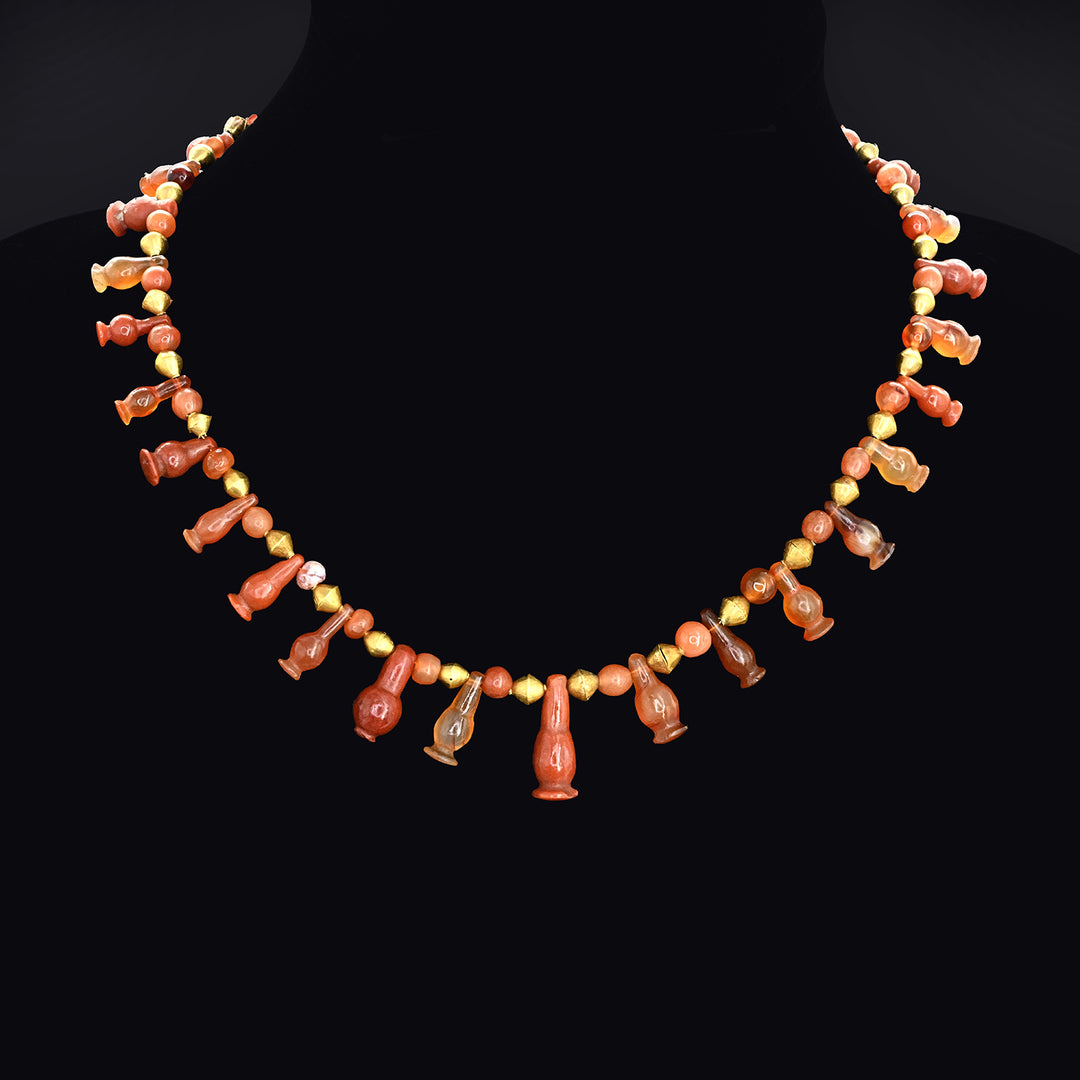 An Egyptian Carnelian, Red Jasper and Gold Bead Necklace, late 18th Dynasty, ca. 1350 - 1295 BCE