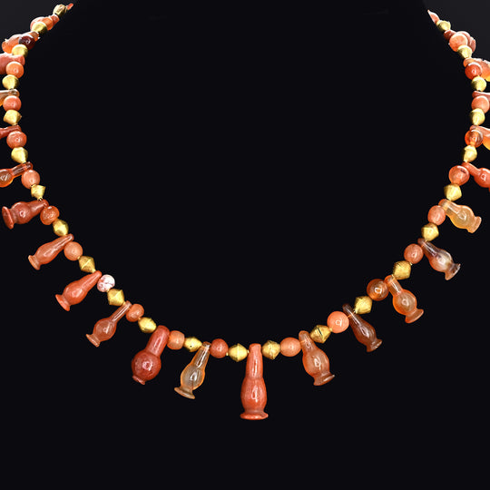 An Egyptian Carnelian, Red Jasper and Gold Bead Necklace, late 18th Dynasty, ca. 1350 - 1295 BCE